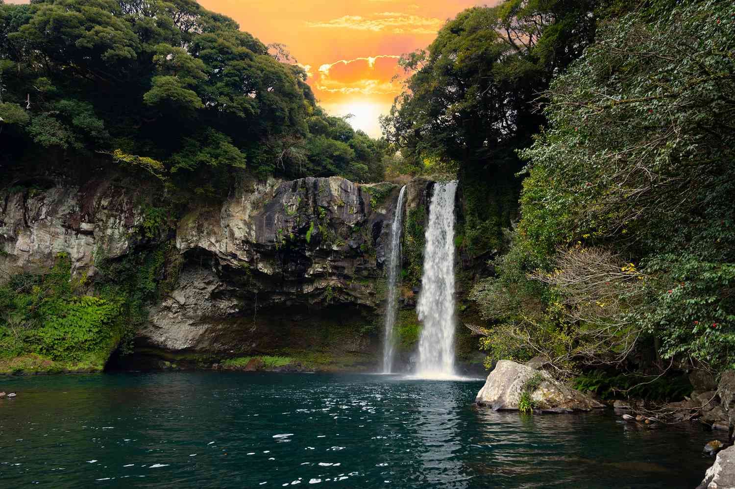 Cheonjiyeon Waterfall at sunset, Jeju Island