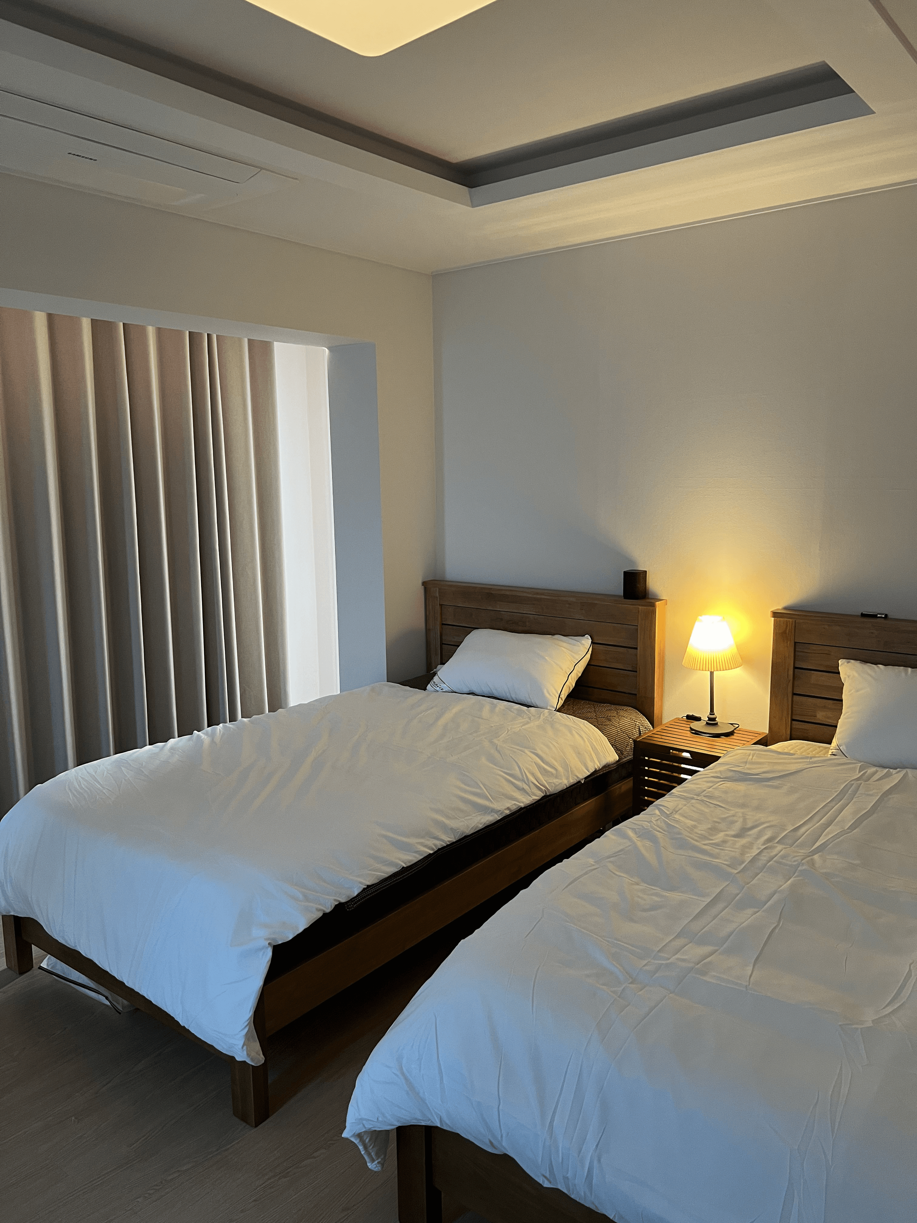 Twin bed room with ambient lighting