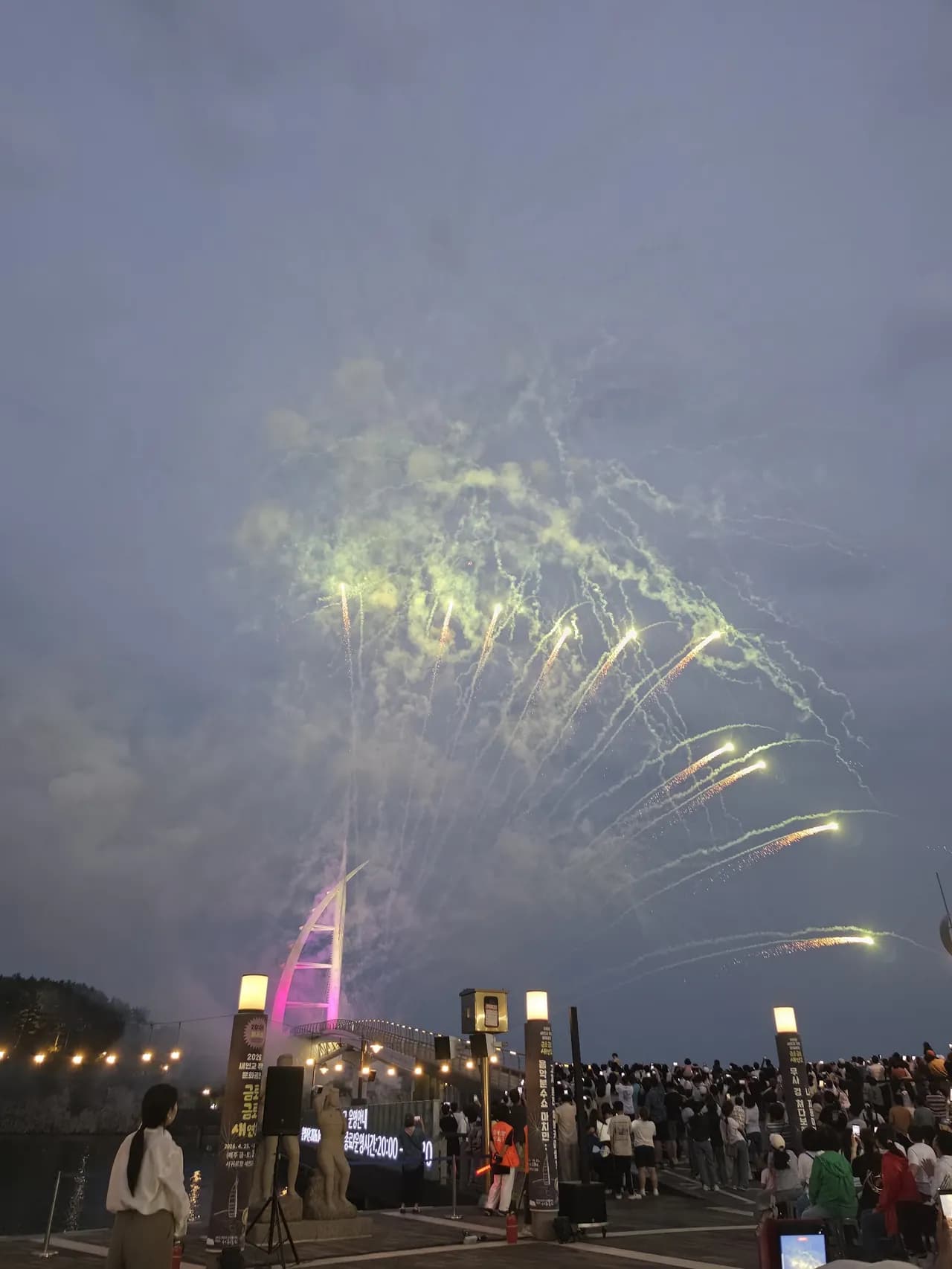 Fireworks lighting up the night over a harbor festival