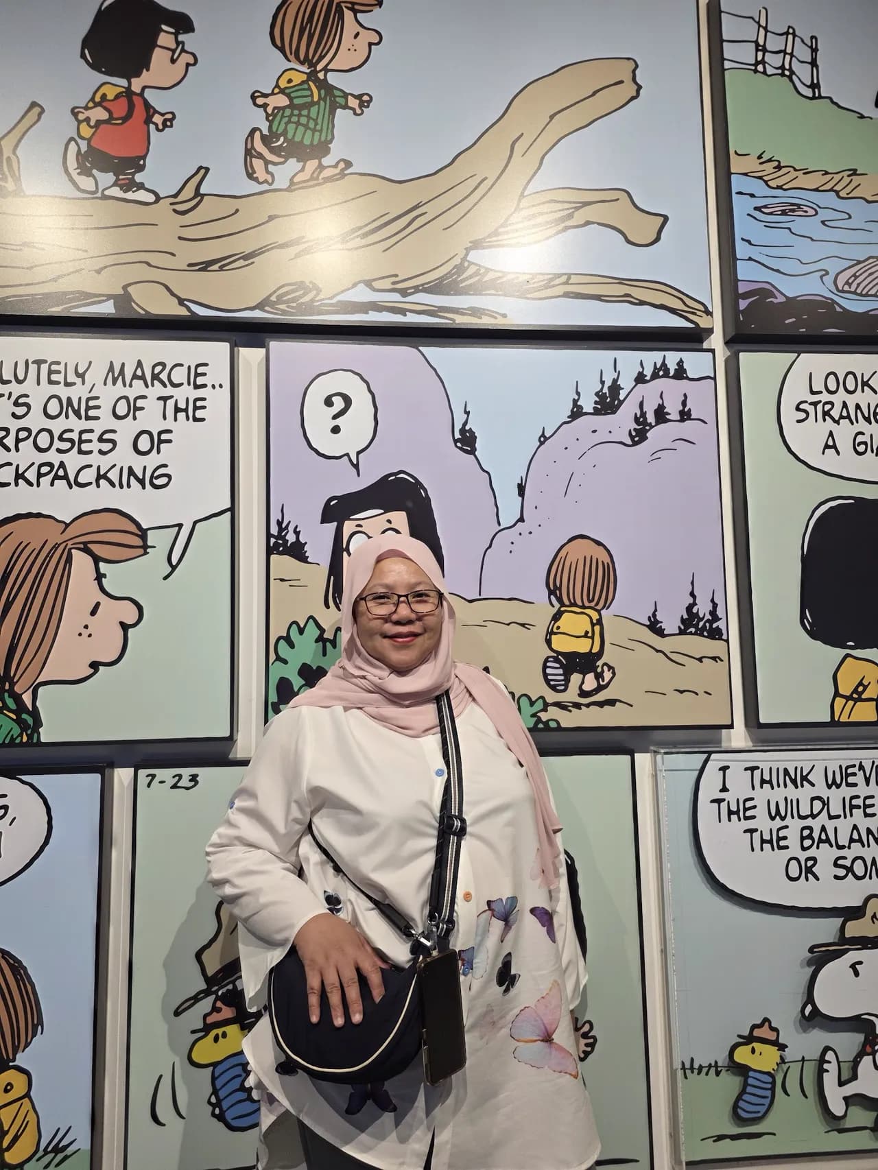 Posing inside a comic-style WANTED photo prop